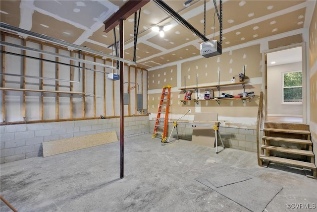 11202 Heathstead Rd, Chester, VA 23831 - garage featuring a garage door opener and a workshop area