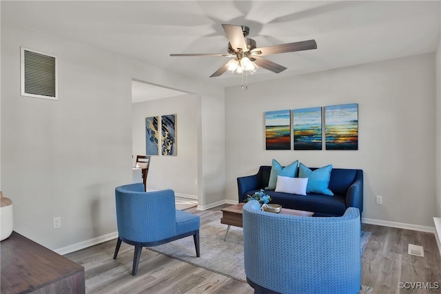 11202 Heathstead Rd, Chester, VA 23831 - living area featuring wood finished floors, ceiling fan, and baseboards