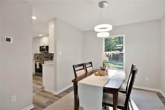 11202 Heathstead Rd, Chester, VA 23831 - dining space featuring light wood-style floors, baseboards, and recessed lighting