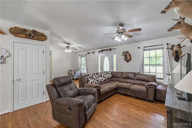 17063 Moores Mill Rd, Ruther Glen, VA 22546 - living room with ceiling fan, light wood-style floors, and a textured ceiling