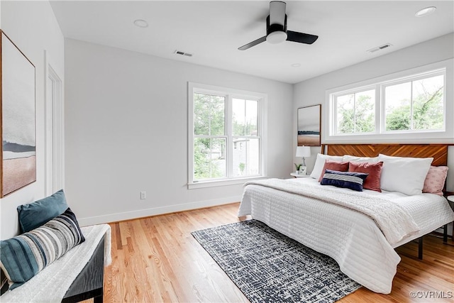 2207 Fairmount Ave, Richmond, VA 23223 - bedroom featuring baseboards, light wood-style floors, a ceiling fan, and recessed lighting