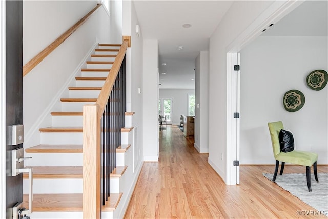2207 Fairmount Ave, Richmond, VA 23223 - stairway featuring wood finished floors and baseboards
