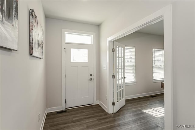18160 Sagamore Dr, Chesterfield, VA 23120 - foyer entrance with dark wood-type flooring and baseboards