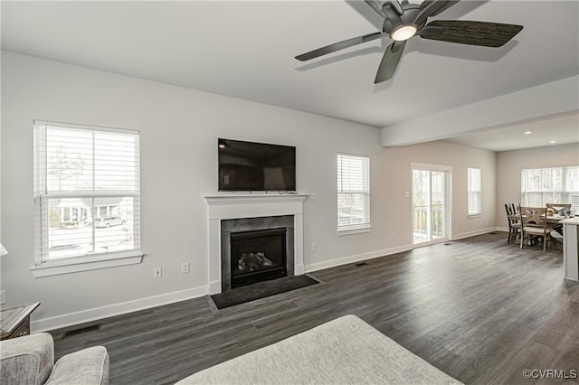 18160 Sagamore Dr, Chesterfield, VA 23120 - living room featuring dark wood finished floors, a fireplace with flush hearth, baseboards, ceiling fan, and recessed lighting