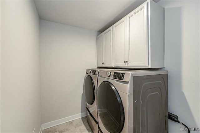 18160 Sagamore Dr, Chesterfield, VA 23120 - laundry room with washing machine and clothes dryer, cabinet space, and baseboards