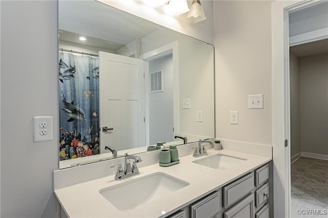 18160 Sagamore Dr, Chesterfield, VA 23120 - bathroom featuring double vanity and recessed lighting