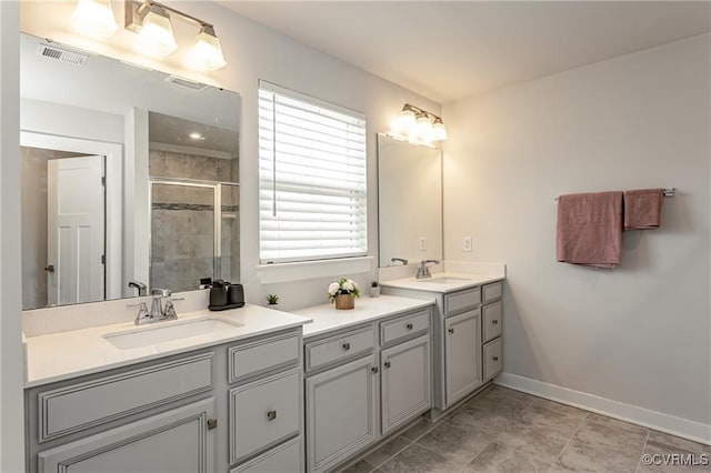 18160 Sagamore Dr, Chesterfield, VA 23120 - full bathroom with a shower stall, double vanity, and baseboards
