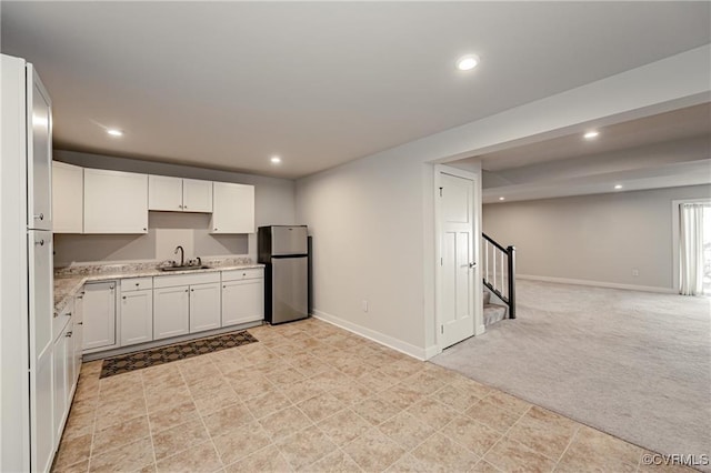18160 Sagamore Dr, Chesterfield, VA 23120 - kitchen with freestanding refrigerator, a sink, light colored carpet, recessed lighting, and open floor plan