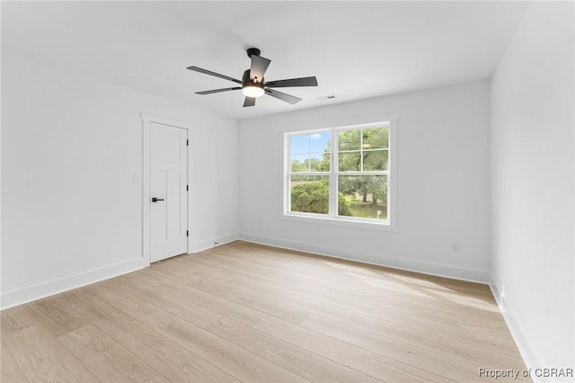 107 Wheeley Cir, Yorktown, VA 23693 - spare room featuring a ceiling fan, light wood-type flooring, and baseboards