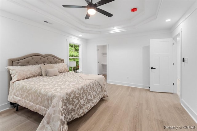 107 Wheeley Cir, Yorktown, VA 23693 - bedroom featuring a tray ceiling, light wood-style flooring, recessed lighting, crown molding, and baseboards