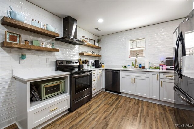 317 Cedar Ln, Hopewell, VA 23860 - kitchen with black appliances, wall chimney range hood, open shelves, a sink, and light countertops