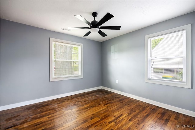317 Cedar Ln, Hopewell, VA 23860 - empty room featuring dark wood-type flooring, baseboards, and ceiling fan