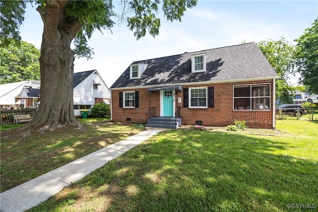 317 Cedar Ln, Hopewell, VA 23860 - cape cod-style house with crawl space, brick siding, and a shingled roof