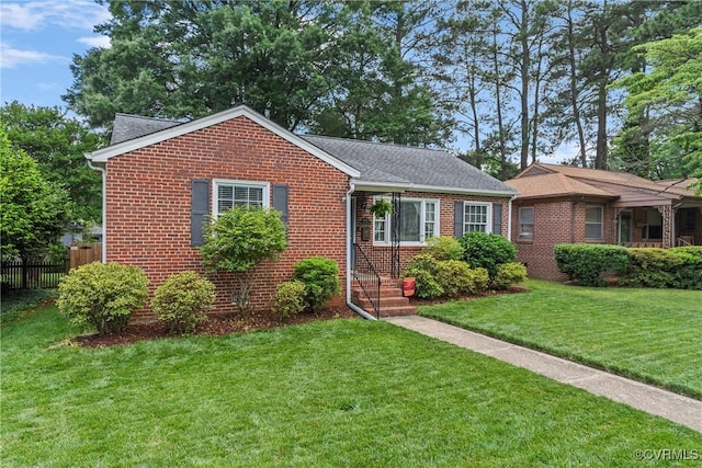 4719 W Grace St, Richmond, VA 23230 - view of front of house with brick siding and roof with shingles