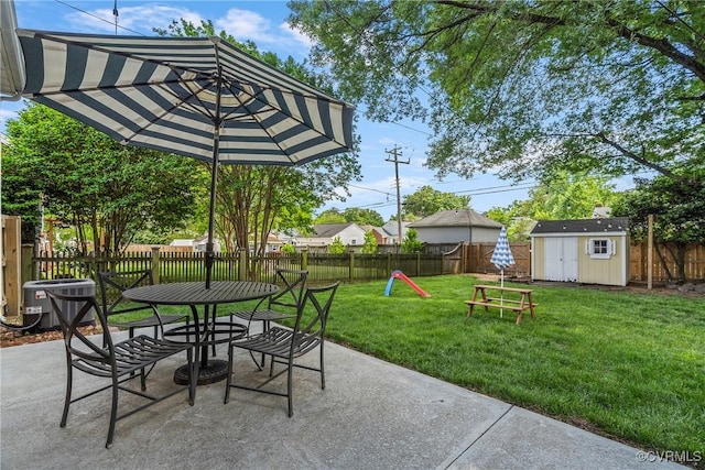 4719 W Grace St, Richmond, VA 23230 - view of patio featuring outdoor dining space and central AC