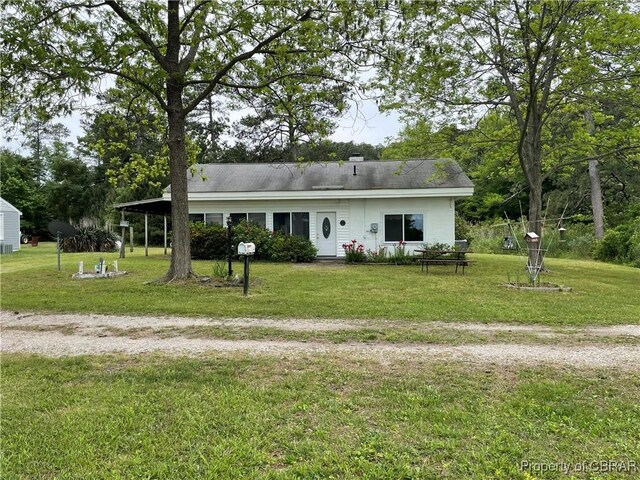 175 Riverview Ave, Water View, VA 23180 - ranch-style house featuring a front lawn and a chimney