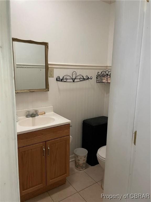 175 Riverview Ave, Water View, VA 23180 - bathroom featuring tile patterned flooring, vanity, wainscoting, and toilet