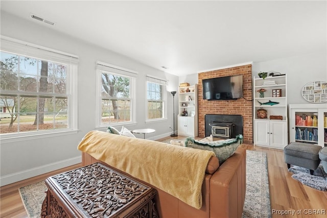 3438 Vaughan Creek Dr, Hayes, VA 23072 - living area with light wood finished floors and baseboards