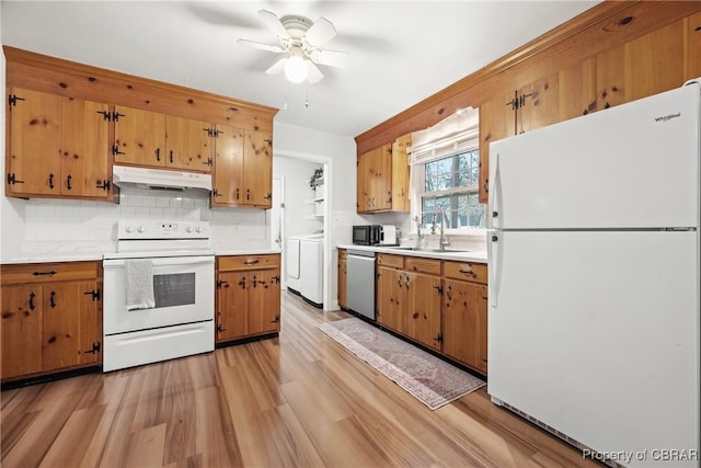 3438 Vaughan Creek Dr, Hayes, VA 23072 - kitchen with white appliances, under cabinet range hood, a sink, light countertops, and ceiling fan