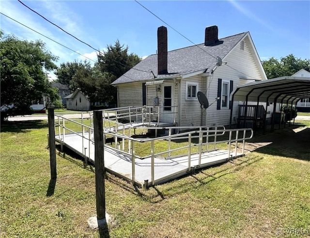 400 Allen Ave, Hopewell, VA 23860 - rear view of house with a chimney, a lawn, and a carport