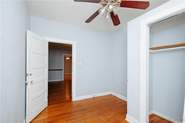 400 Allen Ave, Hopewell, VA 23860 - unfurnished bedroom with wood finished floors, a closet, baseboards, and ceiling fan