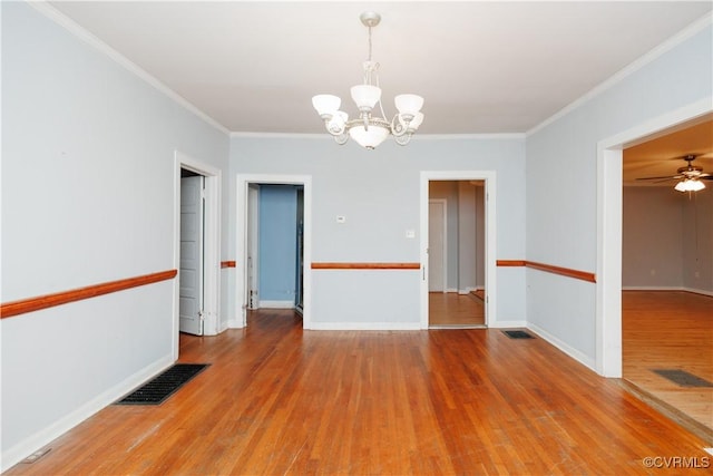 400 Allen Ave, Hopewell, VA 23860 - spare room featuring a chandelier, wood finished floors, crown molding, and baseboards