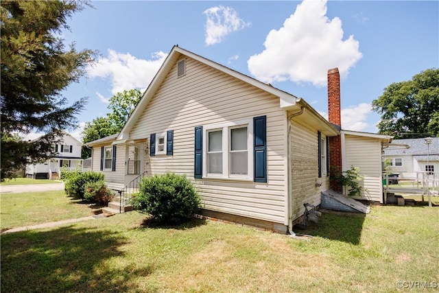 400 Allen Ave, Hopewell, VA 23860 - view of home's exterior with a chimney and a yard