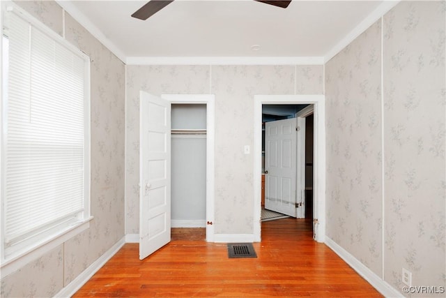 400 Allen Ave, Hopewell, VA 23860 - unfurnished bedroom with light wood-style flooring and ceiling fan