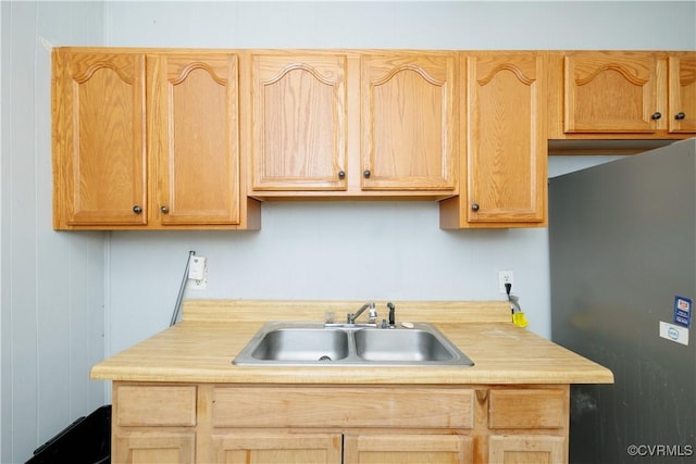 400 Allen Ave, Hopewell, VA 23860 - kitchen featuring a sink, freestanding refrigerator, and light brown cabinets