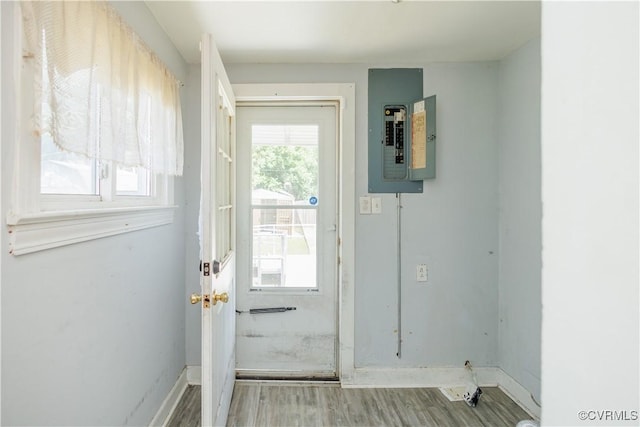 400 Allen Ave, Hopewell, VA 23860 - doorway to outside with electric panel, wood finished floors, and baseboards