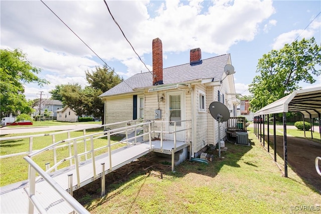 400 Allen Ave, Hopewell, VA 23860 - rear view of property with central AC unit, a chimney, a lawn, and a carport