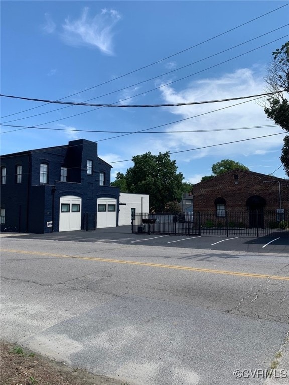 225 N S St, Petersburg, VA 23803 - view of building exterior with uncovered parking