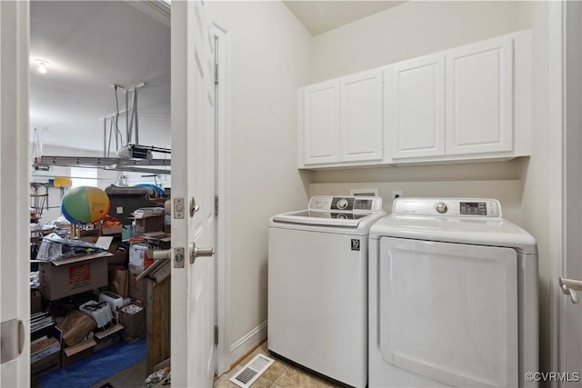 14109 Rigney Dr, Midlothian, VA 23113 - laundry room with cabinet space, washing machine and dryer, and baseboards