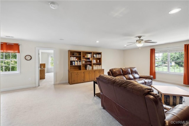 14109 Rigney Dr, Midlothian, VA 23113 - living room featuring plenty of natural light, ceiling fan, light colored carpet, recessed lighting, and baseboards