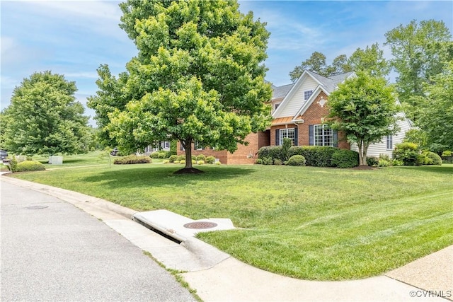 14109 Rigney Dr, Midlothian, VA 23113 - view of front of house with brick siding and a front lawn