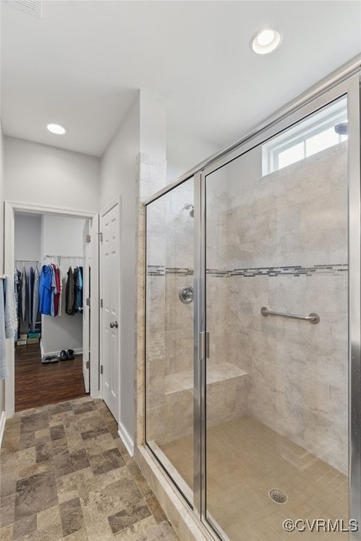 13524 Thomaswoods Ln, Ashland, VA 23005 - bathroom featuring a shower stall, a walk in closet, and recessed lighting