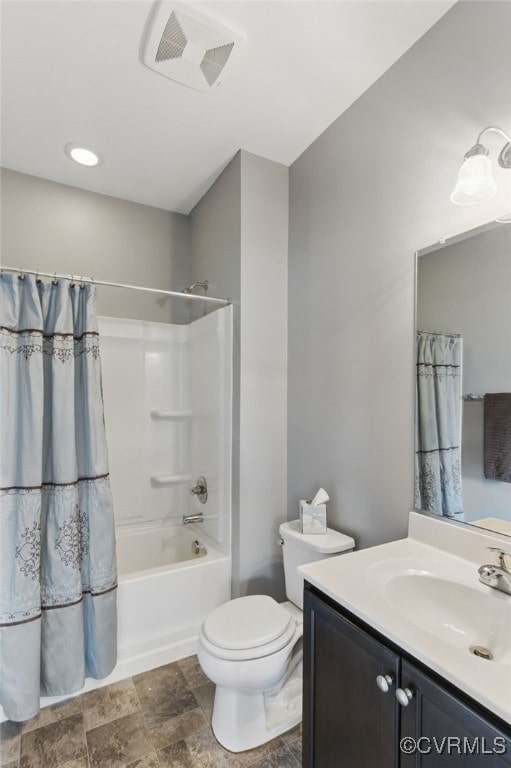 13524 Thomaswoods Ln, Ashland, VA 23005 - bathroom featuring vanity, stone finish floors, toilet, and shower / tub combo