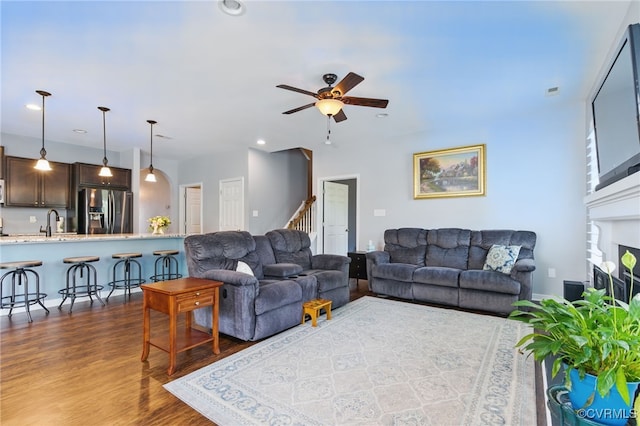 13524 Thomaswoods Ln, Ashland, VA 23005 - living area with dark wood finished floors, a ceiling fan, stairs, and recessed lighting
