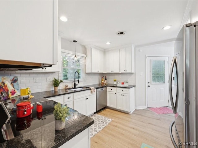 2004 Deer Meadow Ct, Chesterfield, VA 23112 - kitchen with appliances with stainless steel finishes, a sink, light wood-style flooring, white cabinets, and recessed lighting