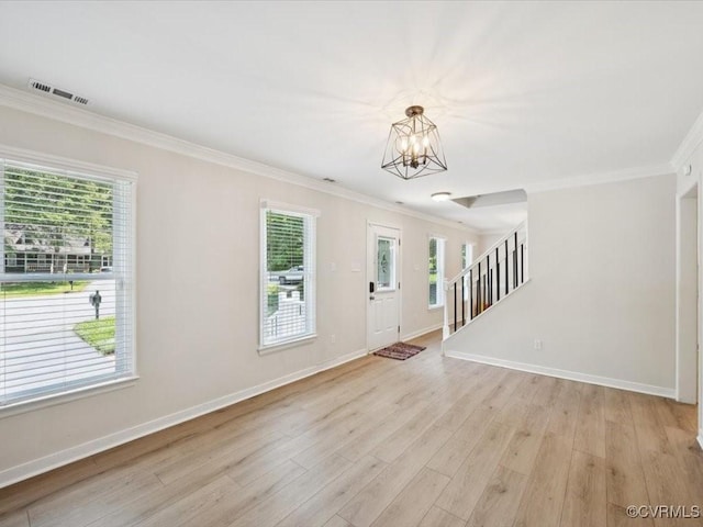 2004 Deer Meadow Ct, Chesterfield, VA 23112 - foyer entrance with a chandelier, crown molding, plenty of natural light, stairs, and light wood-style floors