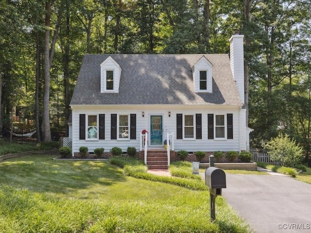 2004 Deer Meadow Ct, Chesterfield, VA 23112 - cape cod-style house with a chimney, a front yard, roof with shingles, and view of wooded area