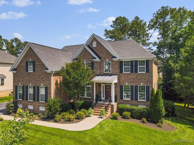 16300 Midnight Xing, Chesterfield, VA 23120 - georgian-style home featuring brick siding, a front lawn, and a shingled roof