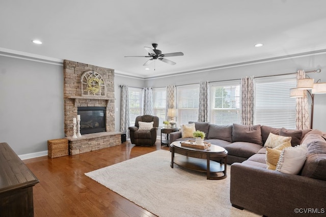 16300 Midnight Xing, Chesterfield, VA 23120 - living room featuring ornamental molding, ceiling fan, recessed lighting, baseboards, and a stone fireplace