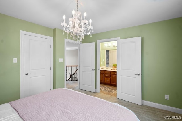 16300 Midnight Xing, Chesterfield, VA 23120 - bedroom with light colored carpet, a chandelier, baseboards, and connected bathroom