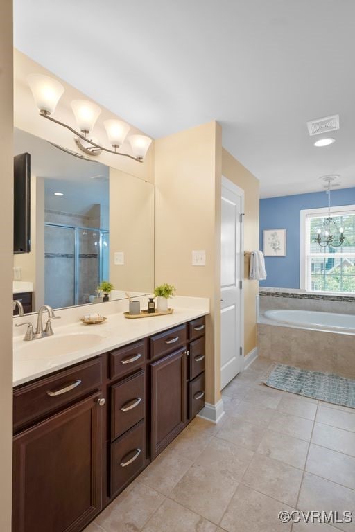 16300 Midnight Xing, Chesterfield, VA 23120 - bathroom with vanity, a bath, tile patterned flooring, a shower stall, and baseboards