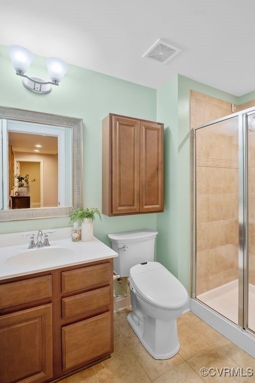 16300 Midnight Xing, Chesterfield, VA 23120 - full bath with vanity, a stall shower, toilet, and tile patterned flooring
