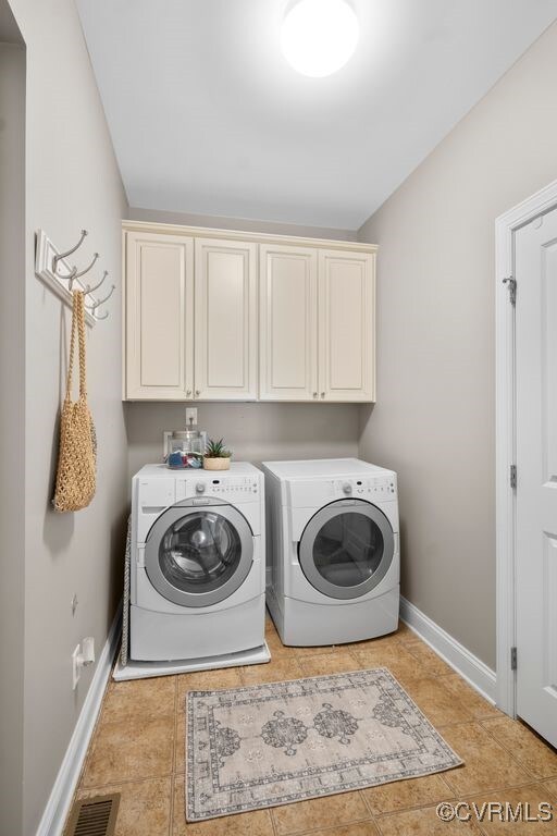 16300 Midnight Xing, Chesterfield, VA 23120 - laundry area with cabinet space, separate washer and dryer, baseboards, and light tile patterned flooring