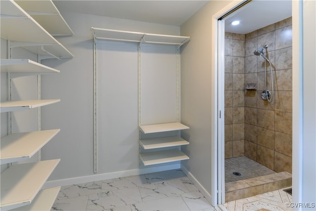 10002 Laurel Lakes Dr, Glen Allen, VA 23060 - full bath with a shower stall, baseboards, and marble look tiles