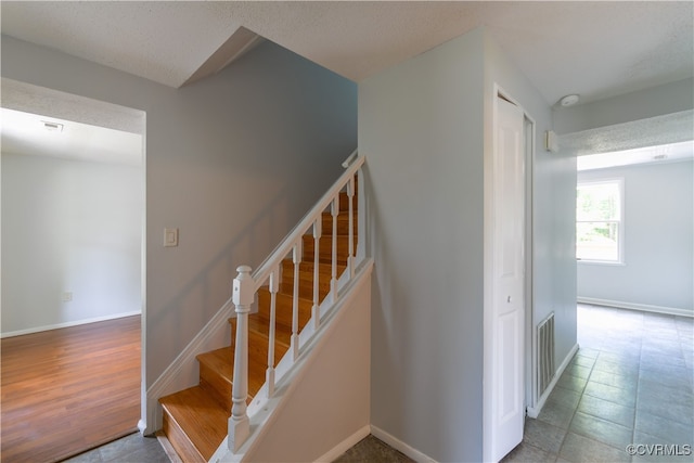 10002 Laurel Lakes Dr, Glen Allen, VA 23060 - staircase featuring baseboards