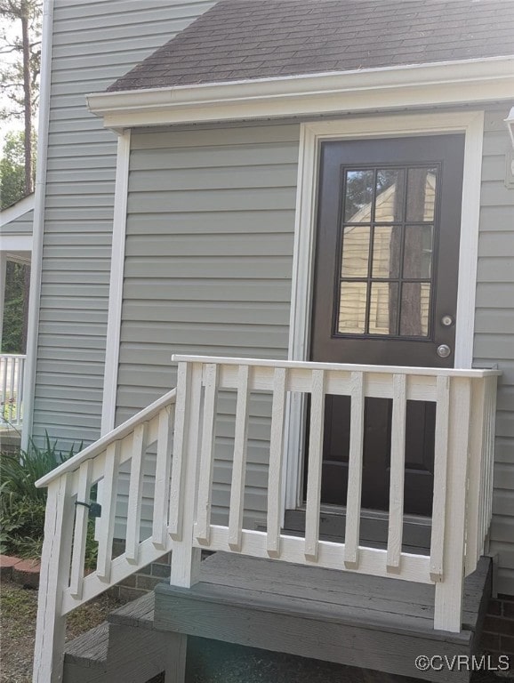 10002 Laurel Lakes Dr, Glen Allen, VA 23060 - view of exterior entry with roof with shingles